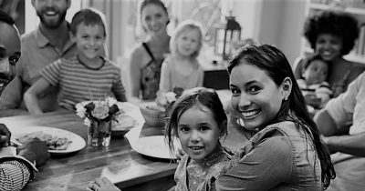 Multirace family at table